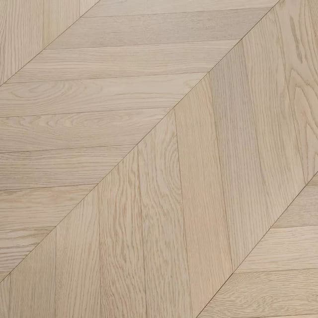 Chevron parquet flooring in pale oak