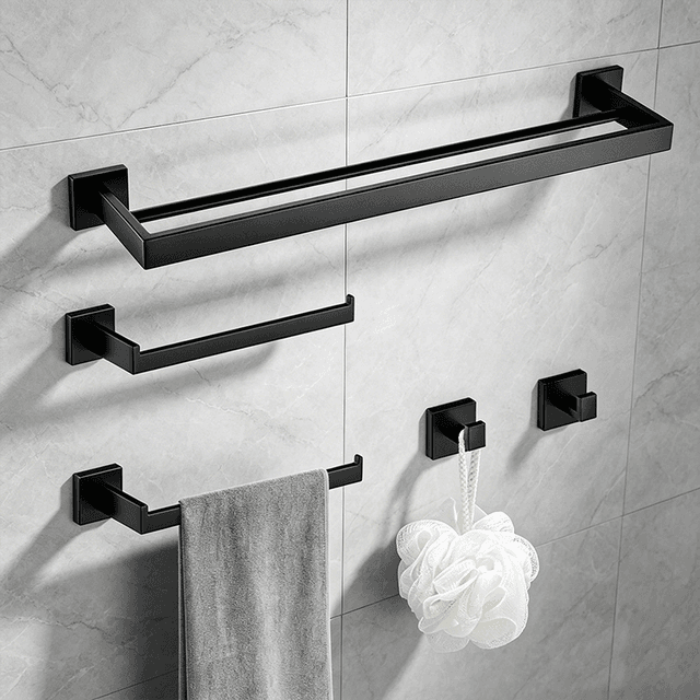 Matte black bathroom accessories fitted to a tiled wall without drilling