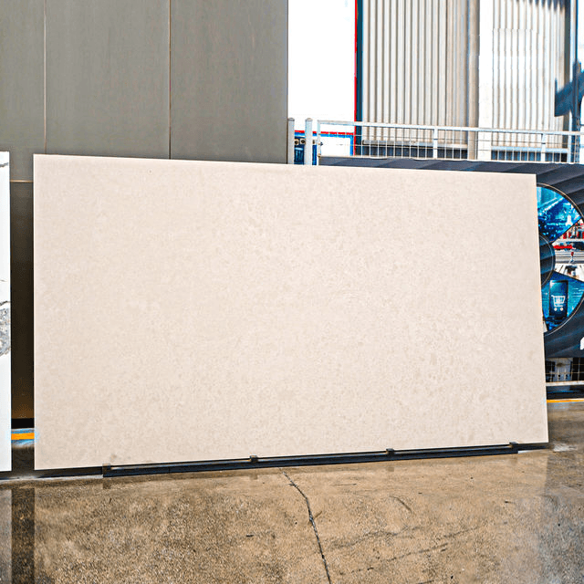 White engineered quartz slab with pale gold veining