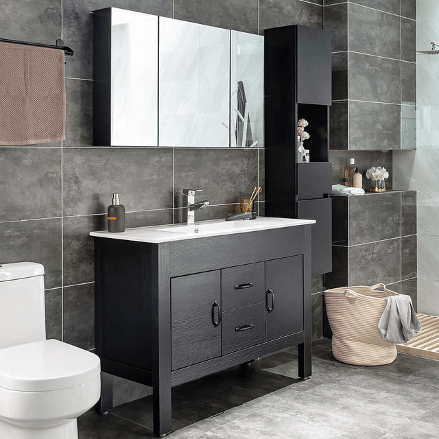 Floor-standing bathroom vanity in dark wood grain with a white ceramic top and mirror cabinet