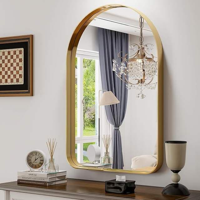 Framed bathroom mirror in brushed gold aluminium with LED backlight