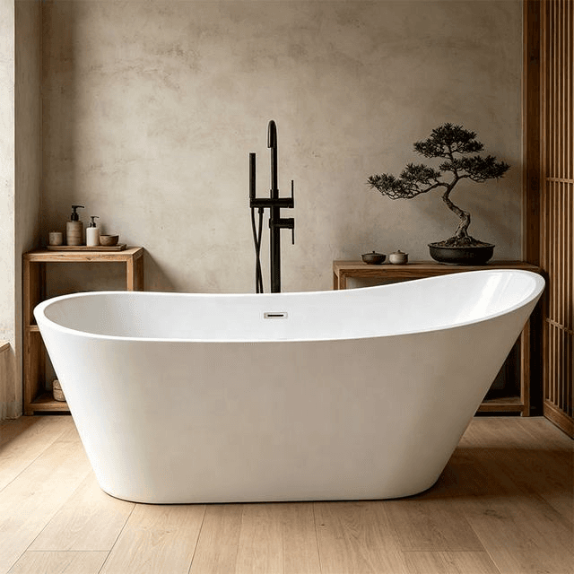 Freestanding white acrylic bathtub with centre drain and a floor-mount filler, view 2