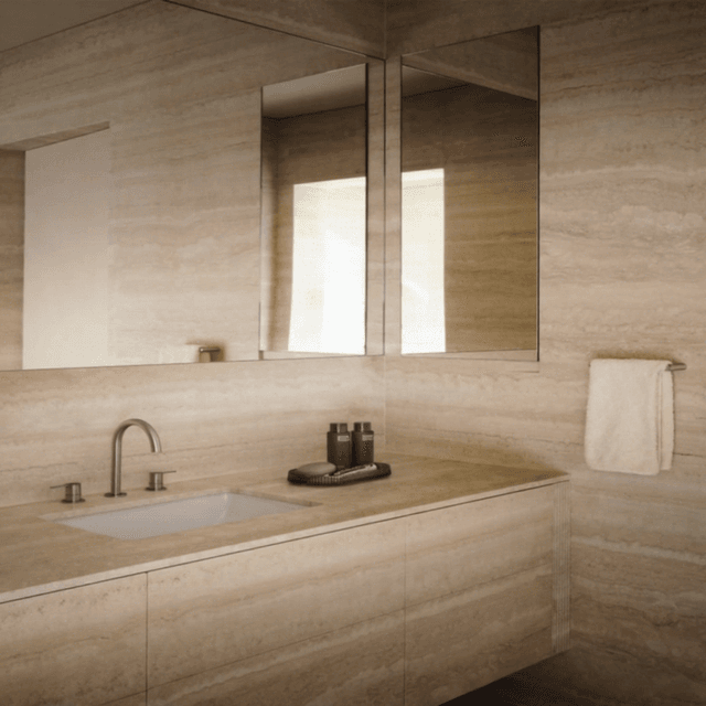 Travertine stone cladding panels in a range of tones