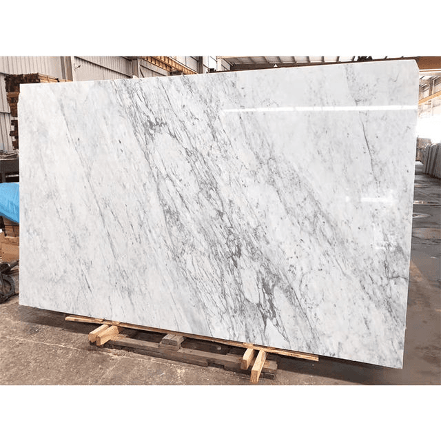 White marble slab with grey veining on a pallet