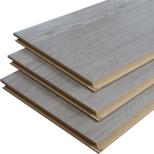 Engineered wood flooring planks showing the layered construction