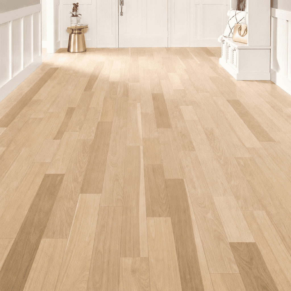 Light wood laminate flooring laid in a room