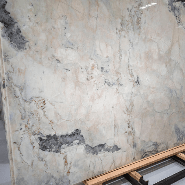 Natural marble slab with grey and gold veining