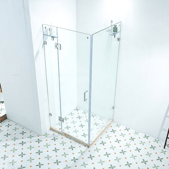 Frameless pivot shower door with top and bottom pivot hardware