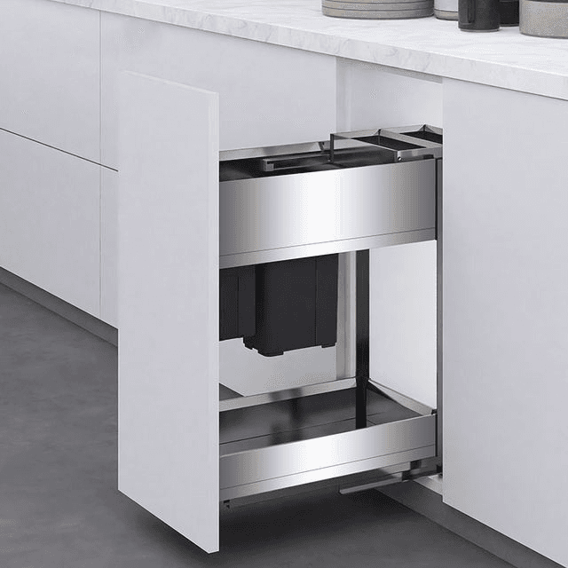 Stainless steel pull-out drawer basket inside a kitchen cabinet
