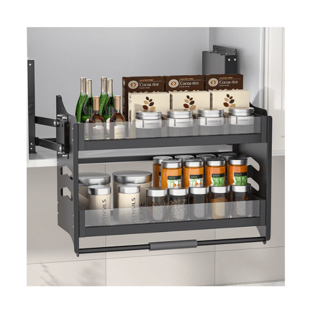Narrow pull-out seasoning basket holding spice jars in a kitchen cabinet