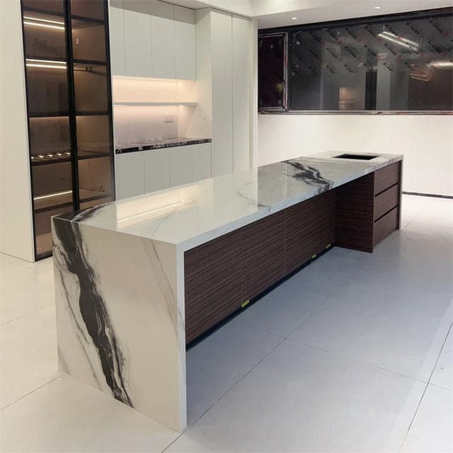 Sintered stone kitchen island with wooden cabinet base in a modern kitchen