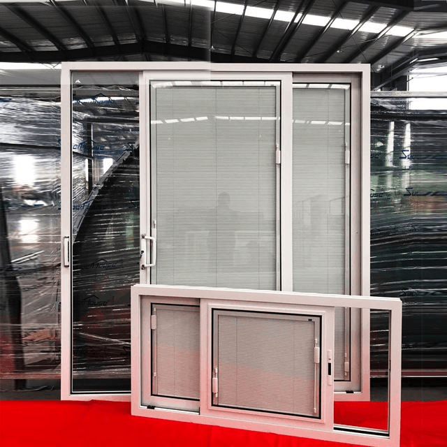 Window with blinds integrated inside the double-glazed cavity